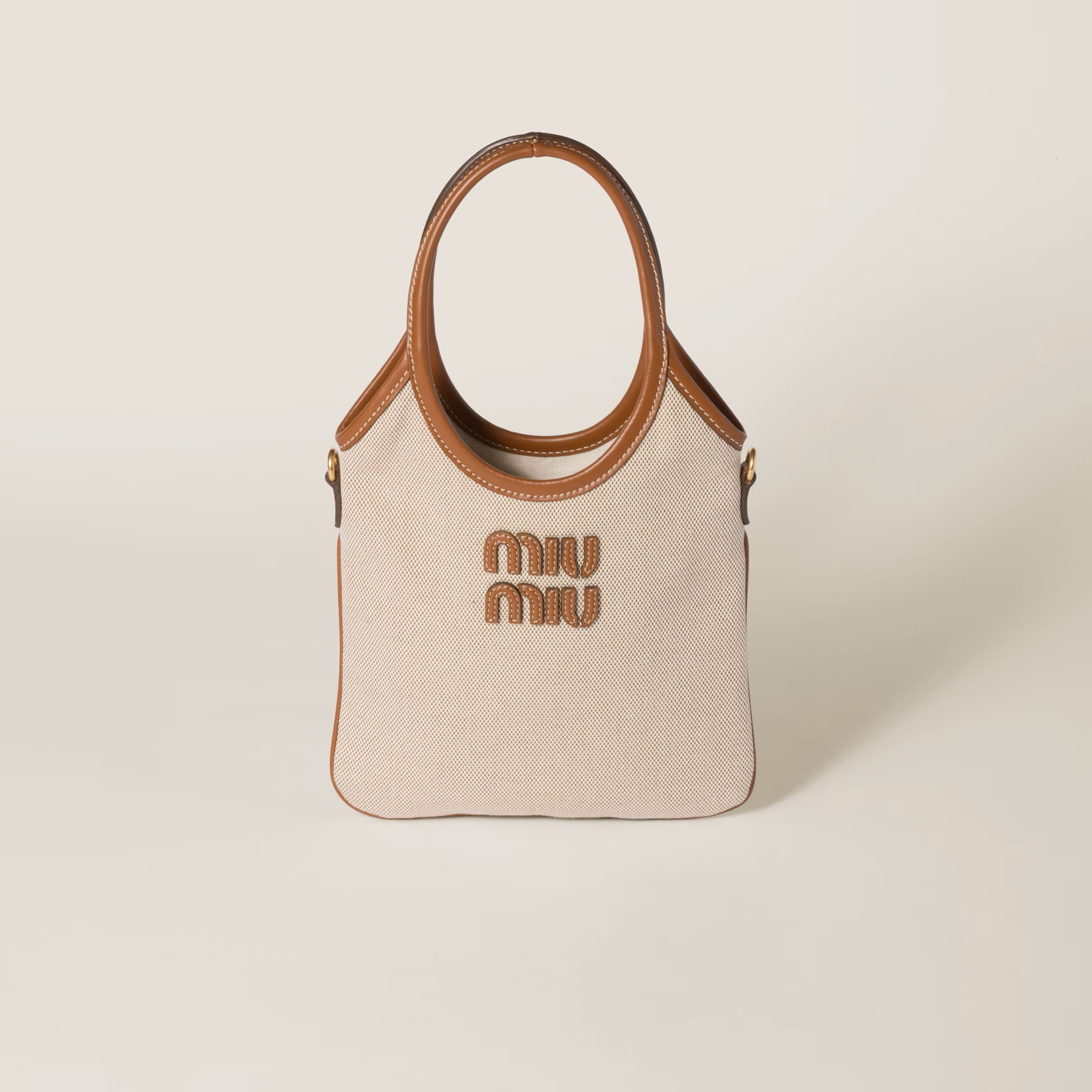 IVY canvas and leather bag - Mini, SGD 2350 (approximately P103,805.82), MIU MIU, miumiu.com